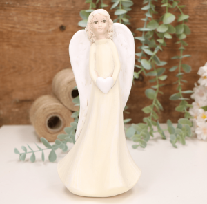 Aniołek dziewczynka z sercem 22cm żółty