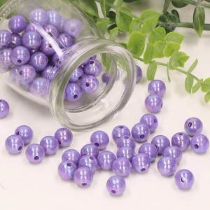 Koraliki ,perełki  fioletowe 0,6 cm 50g      