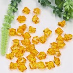 Kamyczki akrylowe z dziurką jasnopomarańczowe 45g. 