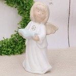 Anioł gipsowy z turkusową książką IHS 20cm