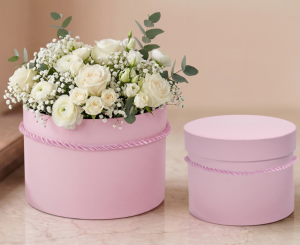 Komplet 2 pudełek różowych okrągłych ze sznurkiem 17x13cm, 15x11cm